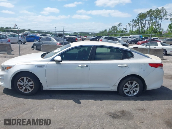 2016 Kia Optima LX z VIN KNAGT4L3XG5095972, wystawiony jako IAAI lot #42130422 z przebiegiem 103 420 mil mil oraz . Historia ofert i sprzedaży dostępna na DreamBid. Obrazek 14.