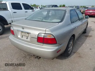 1996 Honda Accord Value with VIN 1HGCD5690TA212711, listed as a IAAI auction lot 42035289 with 184,592 mi miles and . Bid and sale history available at carsss.com. Image 4.