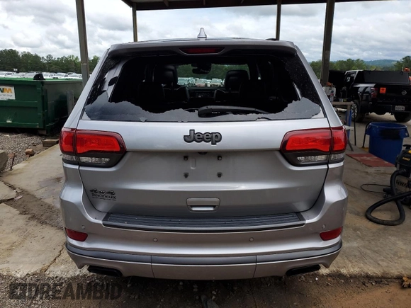 2018 Jeep Grand Cherokee High Altitude with VIN 1C4RJFCT8JC344110, listed as a Copart auction lot 60257065 with 94,917 mi miles and Salvage title. Bid and sale history available at DreamBid. Image 6.