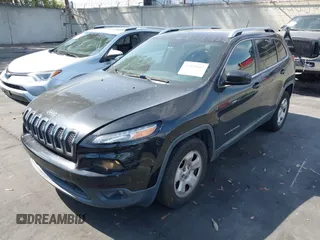 2015 Jeep Cherokee Latitude with VIN 1C4PJLCB9FW627909, listed as a IAAI auction lot 42034667 with 131,739 mi miles and . Bid and sale history available at carsss.com. Image 23.