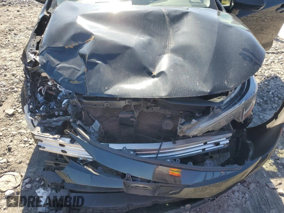 2021 Toyota Corolla L with VIN JTDDPMAEXMJ146209, listed as a Copart auction lot 43800635 with 77,571 mi miles and Salvage Title. Bid and sale history available at DreamBid. Image 11.