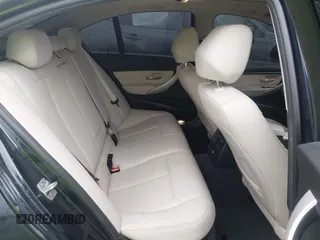 2015 BMW 3 Series 320i xDrive with VIN WBA3C3C57FP664631, listed as a IAAI auction lot 41117730 with 102,555 mi miles and . Bid and sale history available at DreamBid. Image 8.