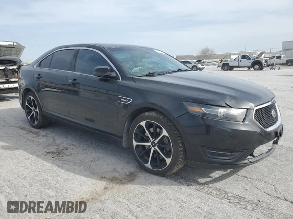 2015 Ford Taurus SHO z VIN 1FAHP2KTXFG121786, wystawiony jako Copart lot #49718275 z przebiegiem 114 946 mil mil oraz Szkoda całkowita • Salvage title. Historia ofert i sprzedaży dostępna na DreamBid. Obrazek 4.