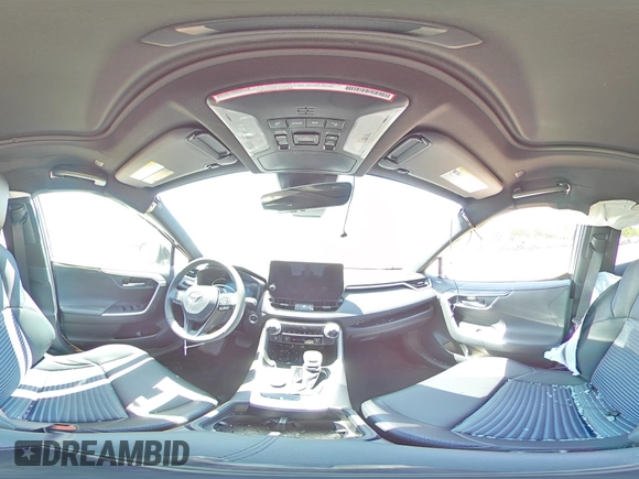 2023 Toyota RAV4 Hybrid XSE with VIN 2T3E6RFV9PW039963, listed as a Copart auction lot 57594335 with 27,486 mi miles and Salvage title. Bid and sale history available at DreamBid. Image 15.