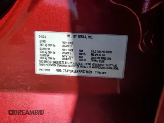 2024 Tesla Model Y Long Range z VIN 7SAYGAEEXRF071829, wystawiony jako Copart lot #56003215 z przebiegiem 29 446 mil mil oraz Szkoda całkowita • Salvage title. Historia ofert i sprzedaży dostępna na DreamBid. Obrazek 12.