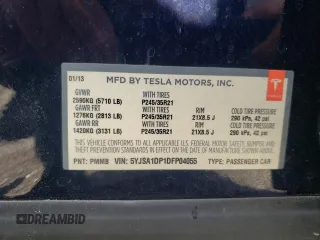 2013 Tesla Model S Performance с VIN 5YJSA1DP1DFP04055, выставлен на аукционе Copart как лот 57418615 с пробегом Не указан миль и Списание • Salvage title. История ставок и продаж доступна на DreamBid. Изображение 12.