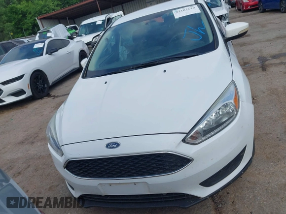 2015 Ford Focus SE with VIN 1FADP3F22FL376042, listed as a IAAI auction lot 42283236 with 76,675 mi miles and . Bid and sale history available at DreamBid. Image 12.