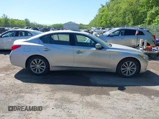2017 Infiniti Q50 Premium z VIN JN1EV7AP9HM734834, wystawiony jako IAAI lot #42132893 z przebiegiem 148 995 mil mil oraz . Historia ofert i sprzedaży dostępna na DreamBid. Obrazek 13.