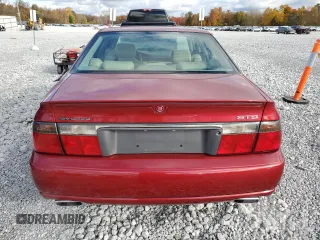 1999 Cadillac Seville Touring STS z VIN 1G6KY5490XU919543, wystawiony jako Copart lot #77068624 z przebiegiem 142 772 mil mil oraz Szkoda całkowita • Salvage title. Historia ofert i sprzedaży dostępna na DreamBid. Obrazek 6.