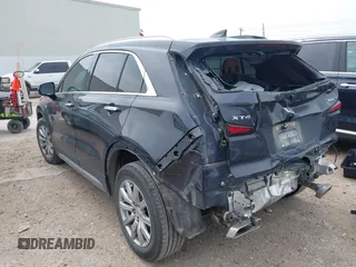 2023 Cadillac XT4 FWD Premium Luxury with VIN 1GYFZCR4XPF101409, listed as a IAAI auction lot 41891293 with 29,355 mi miles and . Bid and sale history available at carsss.com. Image 3.