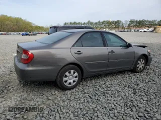2003 Toyota Camry LE with VIN 4T1BE32K23U765973, listed as a Copart auction lot 54613145 with 226,030 mi miles and Salvage Title. Bid and sale history available at DreamBid. Image 3.