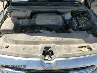 2020 Ram 1500 Big Horn z VIN 1C6RRFBG1LN419693, wystawiony jako Copart lot #51098855 z przebiegiem 82 706 mil mil oraz Szkoda całkowita • Salvage title. Historia ofert i sprzedaży dostępna na DreamBid. Obrazek 13.