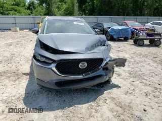 2022 Mazda CX-30 S Carbon Edition с VIN 3MVDMBCL0NM434395, выставлен на аукционе Copart как лот 56247715 с пробегом 40 698 миль миль и На запчасти • Non repairable. История ставок и продаж доступна на DreamBid. Изображение 14.