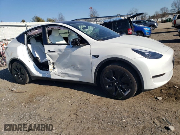 2024 Tesla Model Y Long Range with VIN 7SAYGAEE5RF064240, listed as a Copart auction lot 46349625 with 26,648 mi miles and Salvage title. Bid and sale history available at DreamBid. Image 4.