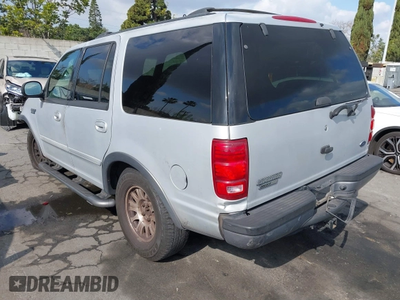 2000 Ford Expedition XLT with VIN 1FMRU1560YLC21781, listed as a IAAI auction lot 41558097 with 218,477 mi miles. Bid and sale history available at carsss.com. Image 3.