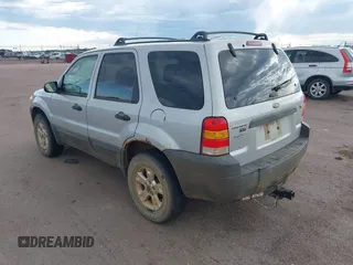 2006 Ford Escape XLT with VIN 1FMYU93186KC23802, listed as a IAAI auction lot 42611582 with 166,871 mi miles and . Bid and sale history available at DreamBid. Image 3.