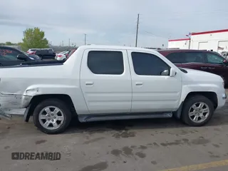 2006 Honda Ridgeline RTL z VIN 2HJYK16586H519593, wystawiony jako IAAI lot #42111678 z przebiegiem 244 962 mil mil oraz . Historia ofert i sprzedaży dostępna na DreamBid. Obrazek 13.