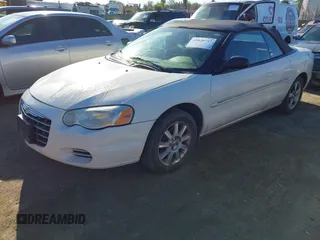 2005 Chrysler Sebring GTC with VIN 1C3EL75R55N613856, listed as a IAAI auction lot 41820747 with Not Provided miles and . Bid and sale history available at DreamBid. Image 2.