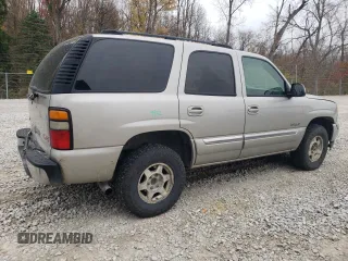 2004 GMC Yukon SLE with VIN 1GKEK13V14J136414, listed as a Copart auction lot 77021464 with 262,143 mi miles and Salvage Title. Bid and sale history available at carsss.com. Image 3.