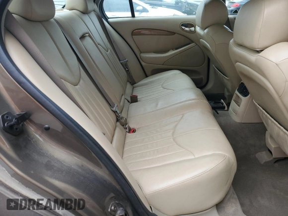 2001 Jaguar S-Type with VIN SAJDA01P21GM04051, listed as a Copart auction lot 46668745 with 81,765 mi miles and Salvage Title. Bid and sale history available at DreamBid. Image 10.