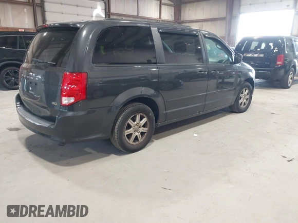 2012 Dodge Grand Caravan SXT with VIN 2C4RDGCG4CR224850, listed as a IAAI auction lot 42070300 with 177,982 mi miles and . Bid and sale history available at DreamBid. Image 4.