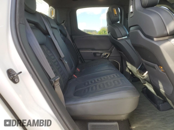 2022 Rivian R1T Launch Edition with VIN 7FCTGAAL7NN005563, listed as a Copart auction lot 47476365 with 39,805 mi miles and Salvage Title. Bid and sale history available at DreamBid. Image 10.