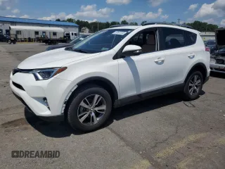 2018 Toyota RAV4 XLE with VIN JTMWFREV9JJ209184, listed as a Copart auction lot 63607245 with 56,796 mi miles and Salvage title. Bid and sale history available at DreamBid. Image 1.