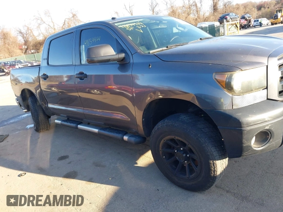 2012 Toyota Tundra 4WD Truck with VIN 5TFDW5F10CX259337, listed as a IAAI auction lot 41854421 with 168,577 mi miles. Bid and sale history available at carsss.com. Image 13.