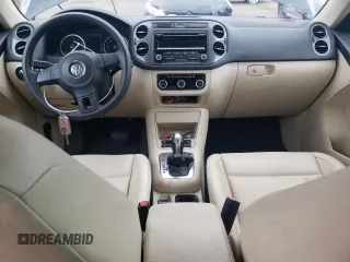 2012 Volkswagen Tiguan SE z VIN WVGAV7AX5CW563536, wystawiony jako Copart lot #52407665 z przebiegiem 136 263 mil mil oraz Szkody całkowita. Historia ofert i sprzedaży dostępna na DreamBid. Obrazek 8.