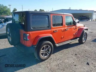 2018 Jeep Wrangler Unlimited Sahara with VIN 1C4HJXEG3JW323634, listed as a IAAI auction lot 41853471 with 126,531 mi miles. Bid and sale history available at carsss.com. Image 4.