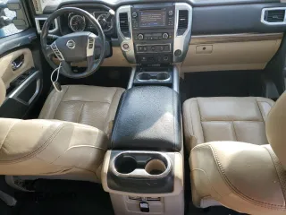 2016 Nissan Titan SL z VIN 1N6BA1F29GN515240, wystawiony jako Copart lot #45185835 z przebiegiem 137 164 mil mil oraz Czysty tytuł • Clean title. Historia ofert i sprzedaży dostępna na DreamBid. Obrazek 8.