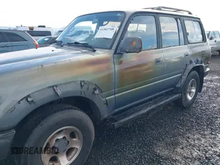 1995 Toyota Land Cruiser z VIN JT3DJ81W0S0094999, wystawiony jako IAAI lot #41583748 z przebiegiem 93 454 mil mil oraz . Historia ofert i sprzedaży dostępna na DreamBid. Obrazek 6.