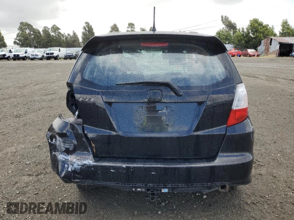 2009 Honda Fit Sport z VIN JHMGE88409S050001, wystawiony jako Copart lot #56575235 z przebiegiem Nie podano mil oraz Nie do naprawy • Non repairable. Historia ofert i sprzedaży dostępna na DreamBid. Obrazek 6.