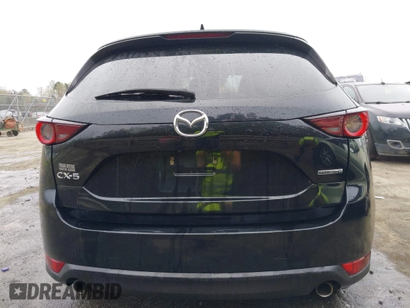 2020 Mazda CX-5 Touring with VIN JM3KFACM9L0770933, listed as a IAAI auction lot 41921464 with 75,997 mi miles. Bid and sale history available at carsss.com. Image 16.