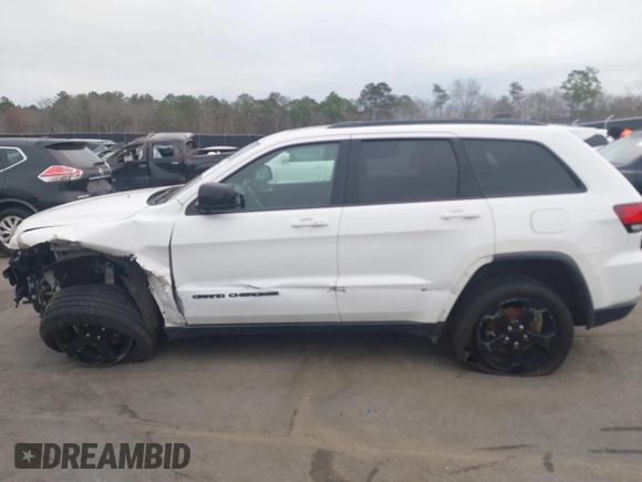 2018 Jeep Grand Cherokee Laredo E with VIN 1C4RJFAG2JC503130, listed as a IAAI auction lot 41527333 with 95,669 mi miles. Bid and sale history available at carsss.com. Image 14.