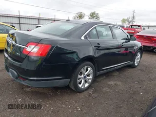2011 Ford Taurus SEL with VIN 1FAHP2EW7BG153319, listed as a IAAI auction lot 41864229 with 190,512 mi miles. Bid and sale history available at carsss.com. Image 4.