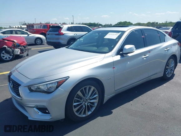 2019 Infiniti Q50 Luxe z VIN JN1EV7AP3KM510305, wystawiony jako IAAI lot #42225255 z przebiegiem 33 902 mil mil oraz . Historia ofert i sprzedaży dostępna na DreamBid. Obrazek 19.