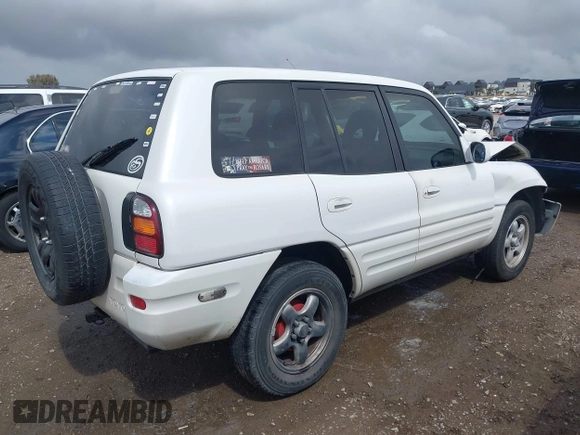 1999 Toyota RAV4 with VIN JT3GP10V7X7057281, listed as a IAAI auction lot 42110228 with 301,749 mi miles and . Bid and sale history available at DreamBid. Image 4.