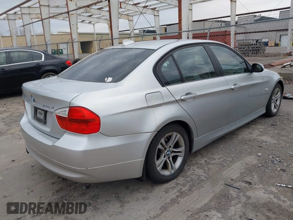 2008 BMW 3 Series 328xi with VIN WBAVC73578KP39571, listed as a IAAI auction lot 41911832 with 130,069 mi miles. Bid and sale history available at carsss.com. Image 4.