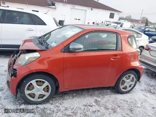 2012 Scion iQ with VIN JTNJJXB08CJ013774, listed as a IAAI auction lot 41418722 with 116,237 mi miles. Bid and sale history available at carsss.com. Image 14.