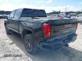 2022 GMC Sierra 1500 Limited AT4 with VIN 1GTP9EELXNZ123439, listed as a IAAI auction lot 40723168 with 63,165 mi miles. Bid and sale history available at carsss.com. Image 3.