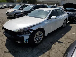 2022 Toyota Mirai XLE с VIN JTDAAAAA6NA006563, выставлен на аукционе Copart как лот 65647213 с пробегом 8 781 миль миль и . История ставок и продаж доступна на DreamBid. Изображение 1.