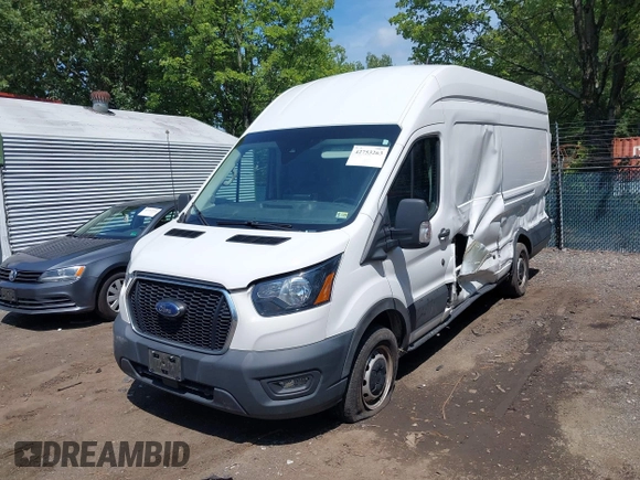 2022 Ford Transit Cargo z VIN 1FTBR3XG4NKA04700, wystawiony jako IAAI lot #42753263 z przebiegiem 80 467 mil mil oraz . Historia ofert i sprzedaży dostępna na DreamBid. Obrazek 2.