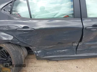2025 Toyota Camry LE с VIN 4T1DBADK6SU517338, выставлен на аукционе IAAI как лот 42006121 с пробегом 13 200 миль миль и . История ставок и продаж доступна на DreamBid. Изображение 19.