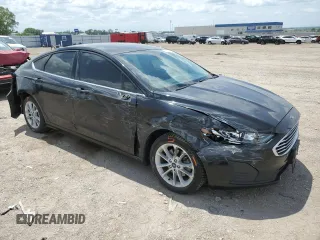 2020 Ford Fusion SE z VIN 3FA6P0LUXLR254247, wystawiony jako Copart lot #60658095 z przebiegiem 76 413 mil mil oraz Szkoda całkowita • Salvage title. Historia ofert i sprzedaży dostępna na DreamBid. Obrazek 4.