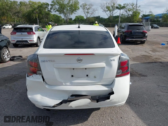2012 Nissan Sentra 2.0 z VIN 3N1AB6AP0CL701340, wystawiony jako IAAI lot #42094800 z przebiegiem 189 128 mil mil oraz . Historia ofert i sprzedaży dostępna na DreamBid. Obrazek 16.