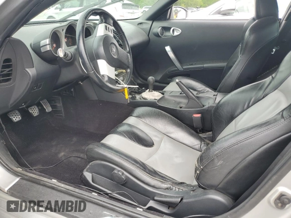 2003 Nissan 350Z Performance z VIN JN1AZ34D63T102739, wystawiony jako Copart lot #55443655 z przebiegiem 162 672 mil mil oraz Tytuł czysty. Historia ofert i sprzedaży dostępna na DreamBid. Obrazek 7.