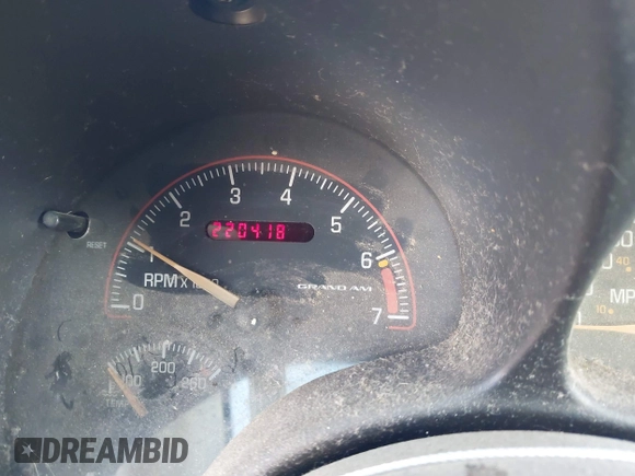 2005 Pontiac Grand Am SE with VIN 1G2NE52E05M215976, listed as a IAAI auction lot 42025657 with 220,418 mi miles. Bid and sale history available at carsss.com. Image 7.