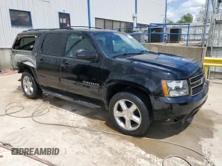 2014 Chevrolet Suburban LT with VIN 1GNSKJE77ER193143, listed as a Copart auction lot 54311935 with 171,407 mi miles and Salvage Title. Bid and sale history available at DreamBid. Image 4.
