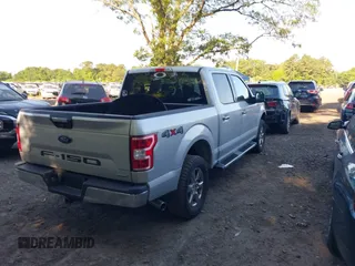 2018 Ford F-150 XL z VIN 1FTEW1EP3JFB34130, wystawiony jako IAAI lot #42539984 z przebiegiem 95 077 mil mil oraz . Historia ofert i sprzedaży dostępna na DreamBid. Obrazek 4.